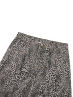 Jeans unisexe coupe large délavé imprimé léopard