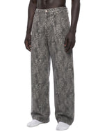 Jeans unisexe coupe large délavé imprimé léopard